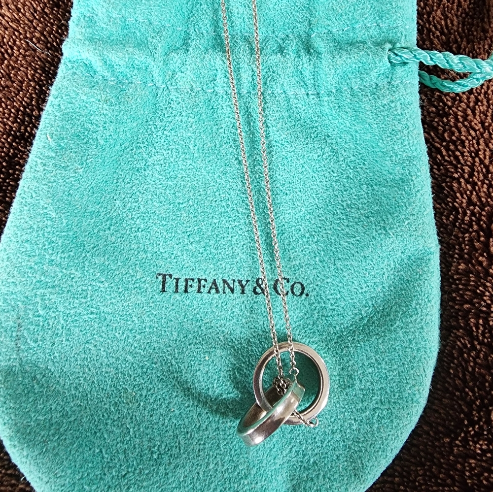 Tiffanys authentic 2 rings necklace . Like new.  Comes with dust bag